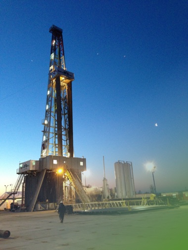 Techdrill drilling rig at dusk